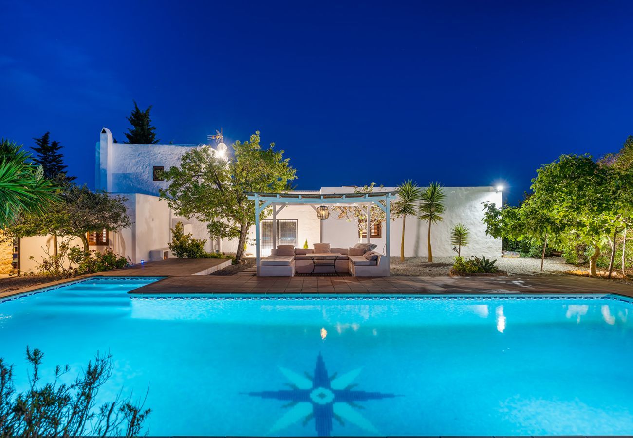 Villa Carroca at night with the private pool illuminated